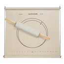 A beige pastry frame with printed circular guides and measurement markings, shown with a white pastry roller on a light gray background.