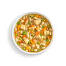 White bowl of chicken stew on a white background
