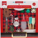 A Cookies for Santa baking set displayed in its packaging, including various cookie cutters, stamps, utensils, and a recipe book.