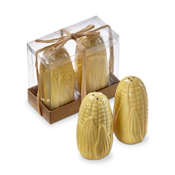 Two sets of corn-shaped salt and pepper shakers, one of them in clear packaging with a brown base, all on a white background.