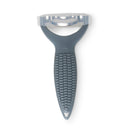 A stainless steel corn stripper with a gray handle and a textured grip.
