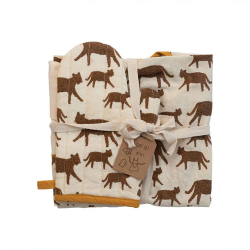 Folded apron, oven mitt set with brown jaguar pattern on a white background