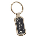 Keychain with 'Robin' engraved on a black background