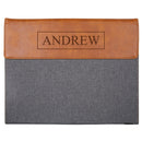Gray padfolio with brown leather wrap and 'ANDREW' engraving on a white background