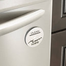 A circular dishwasher magnet with the words 'dirty' and 'clean' on a dishwasher.