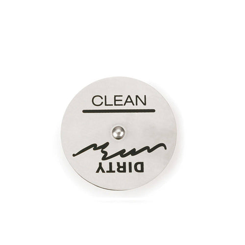 A circular dishwasher magnet that says 'clean' on one side and when spun around says 'dirty' on the other.