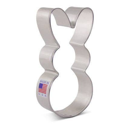Metallic cookie cutter shaped like a bunny with 'Made in USA' label on a white background