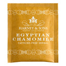 Packaging of Harney & Sons Egyptian Chamomile Caffeine-free Herbal Tea bags with gold and white color scheme.