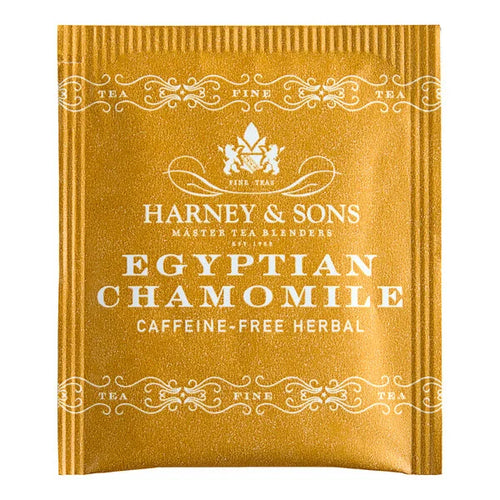 Packaging of Harney & Sons Egyptian Chamomile Caffeine-free Herbal Tea bags with gold and white color scheme.