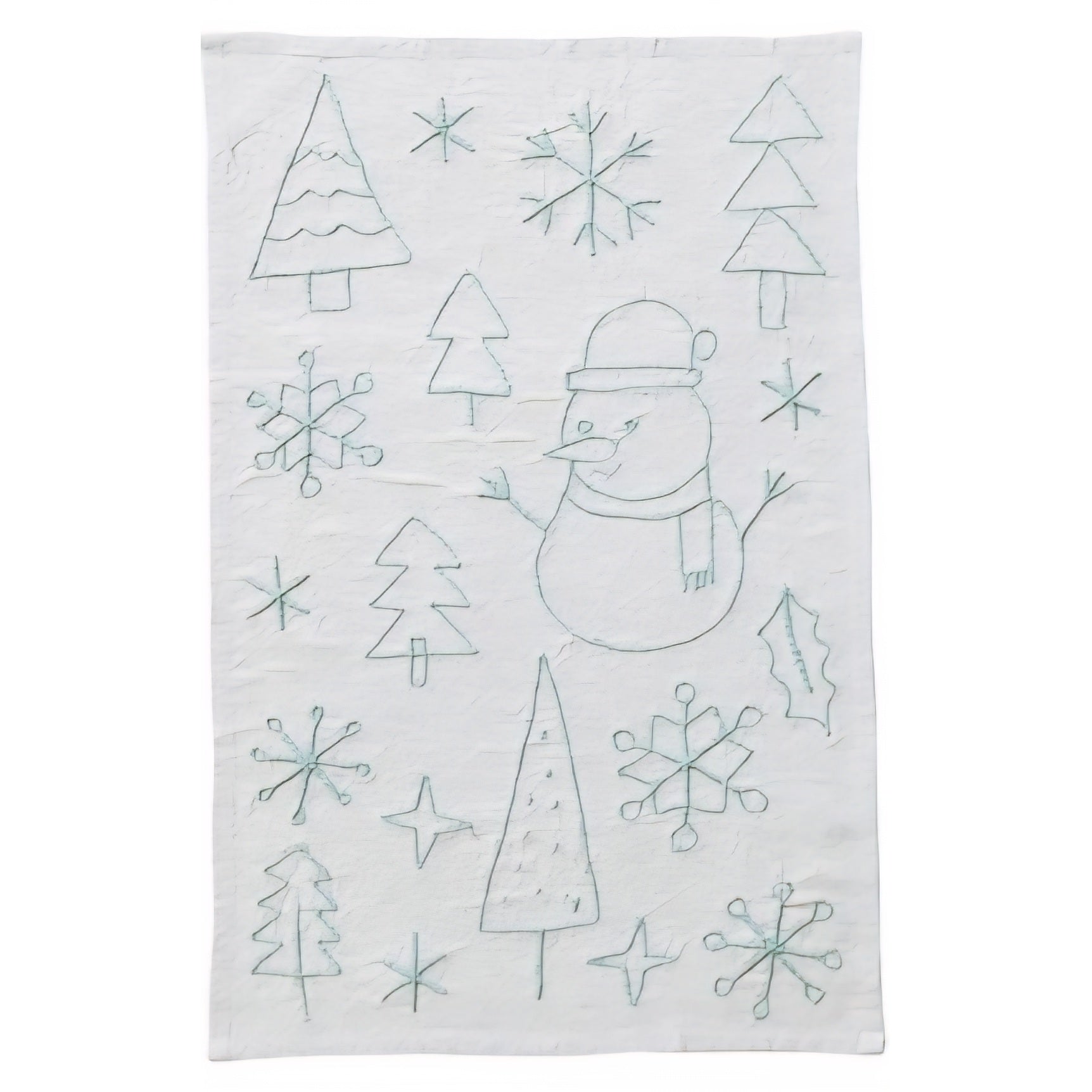 Tea towel with embroidered snowman, trees, and snowflakes on a white background