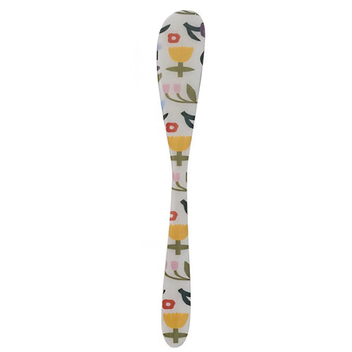 Canape knife with floral pattern on a white background