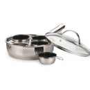 Stainless steel egg poacher set with divided pot and small measuring cup on a white background