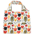 Reusable bag with colorful dog faces themed pattern on a white background