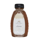 Bottle of Finch & Fennel clover honey on a white background
