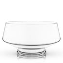Clear glass punch bowl on a white background