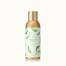 Thymes Fresh Cut Basil air freshener spray bottle on a white background