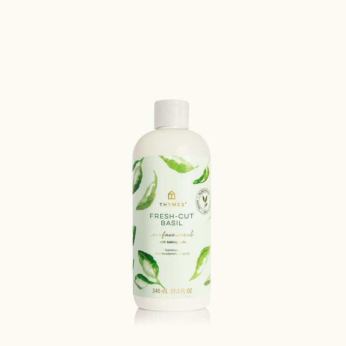Bottle of Thymes Fresh-Cut Basil surface scrub on a white background