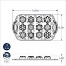 A black and white drawing of a bundt cake pan with mini snowflake molds with measurements showing the dimensions.