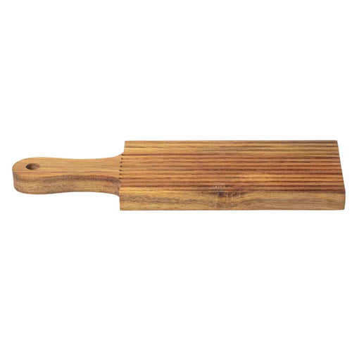 Wooden gnocchi rolling board with handle on a white background