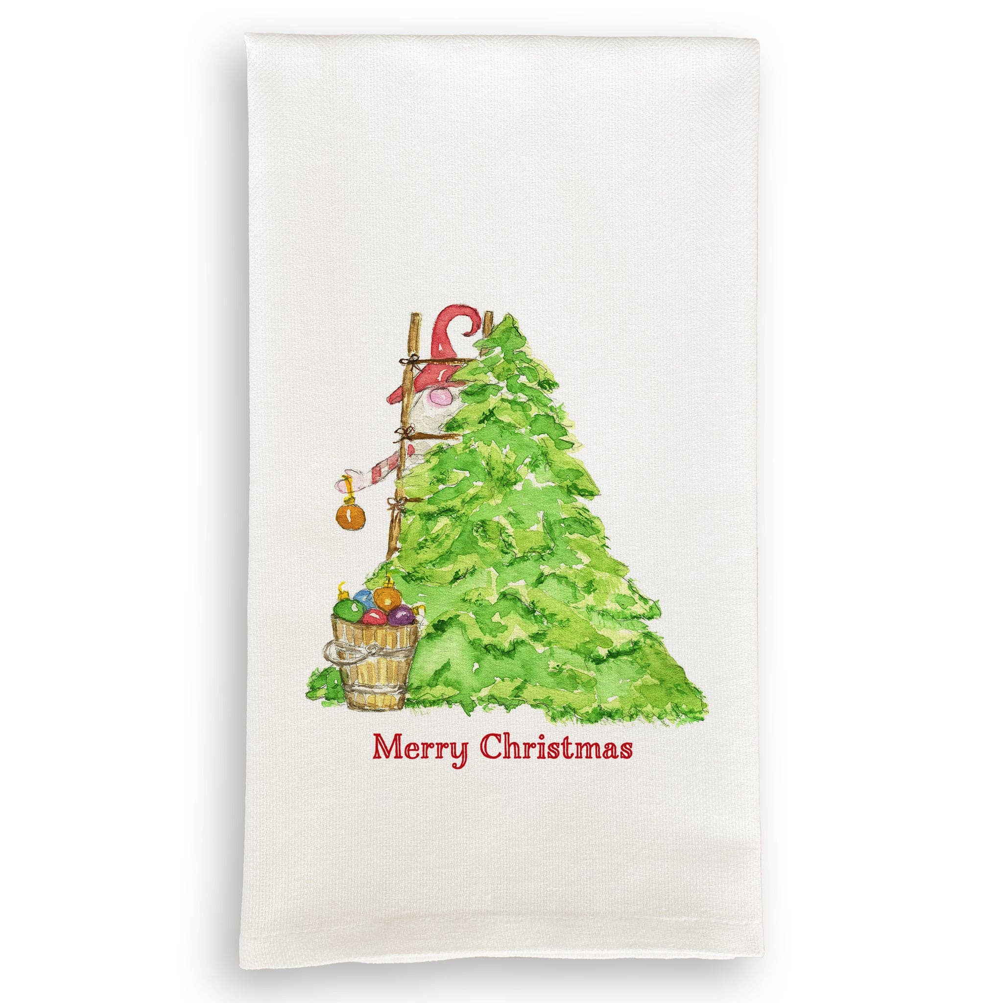 A Christmas-themed dishtowel featuring an illustration of a green Christmas tree with ornaments and a gnome, along with the text 'Merry Christmas'.