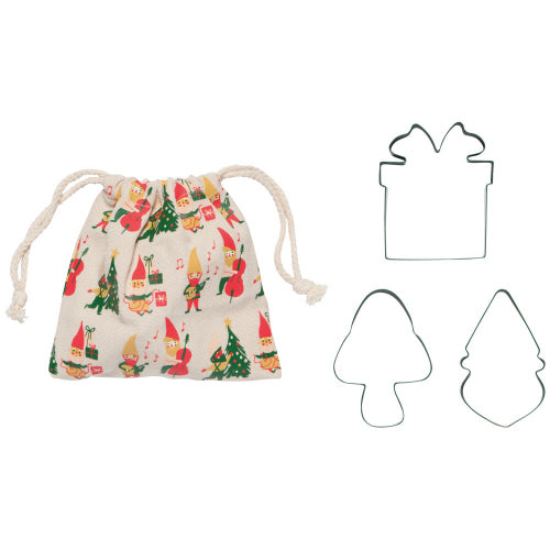 A set of three Christmas-themed cookie cutters with a gnome, mushroom, and present design, along with a drawstring bag.