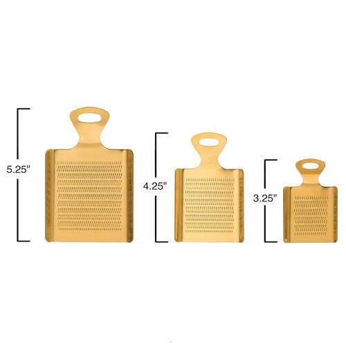 Three gold graters of different sizes with measurements on a white background