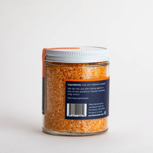 The back label of a jar of sea salt on a white background.