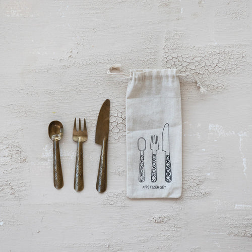 Bronze cutlery set with a drawstring bag featuring cutlery illustrations on a white background.