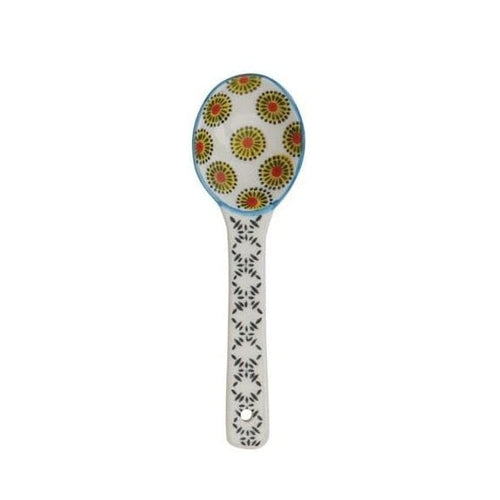A hand painted ceramic spoon on a white background.
