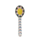 A hand painted ceramic spoon on a white background.