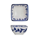 Ceramic bowl with blue vine patterns on a white background