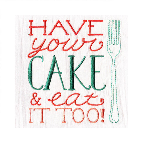 Embroidered tea towel with the phrase 'HAVE your CAKE & eat IT TOO!' featuring a fork, primarily in red and green colors on a white background.