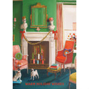 A Christmas-themed greeting card featuring a whimsical illustration of a fireplace with a decorated tree, gifts, and a dog sitting in front of the fireplace. The card has a title 'Warm Holiday Wishes' in red foil.