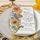 Menu with floral design on a table setting