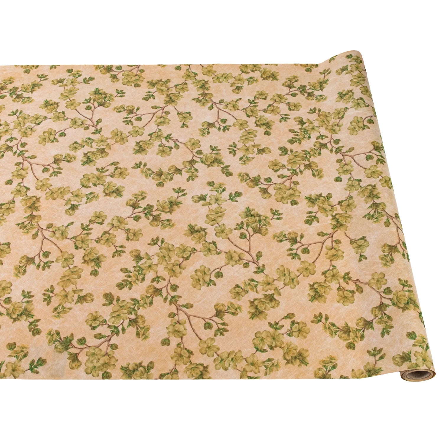 A rolled out paper table runner with a cherry blossom floral pattern in yellow and gold colors on a beige background.