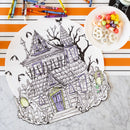 Halloween-themed placemat with crayons and candy on a striped background