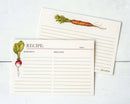 Two cream recipe cards with botanical vegetable illustrations, one showing a radish and the other a carrot, laid flat on a white wood background.