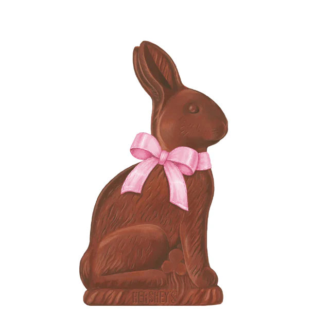 Paper placemat of a chocolate bunny with a pink bow on a white background