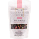 Tea package from 'The Chai Box' with visible ingredients on a white background