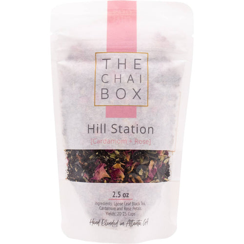 Tea package from 'The Chai Box' with visible ingredients on a white background