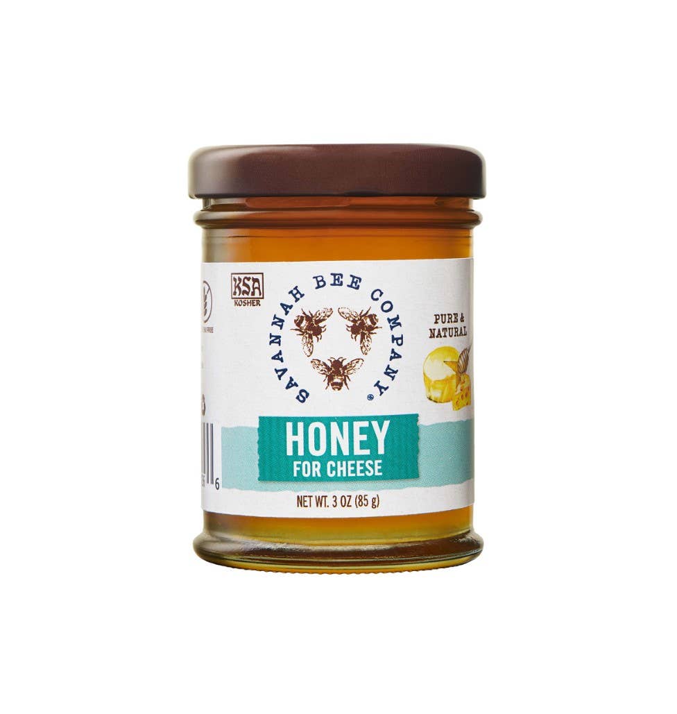 Jar of Savannah Bee Company Honey for Cheese on a white background