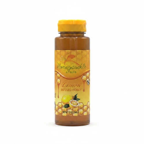 Jar of Honeysuckle Acres Lemon Infused Honey on a white background