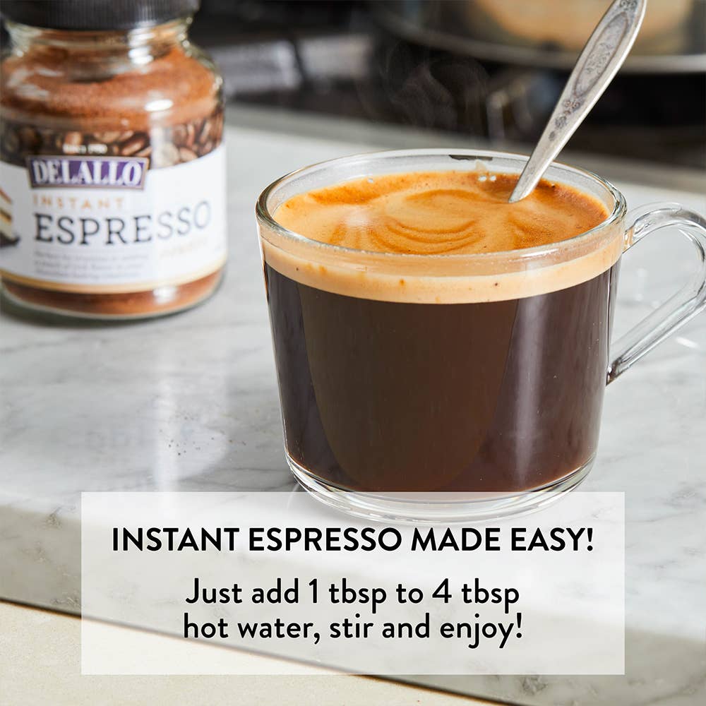 Mug of instant espresso with Delallo brand jar in the background