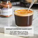 Mug of instant espresso with Delallo brand jar in the background
