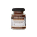 Jar of instant espresso powder with label on a white background