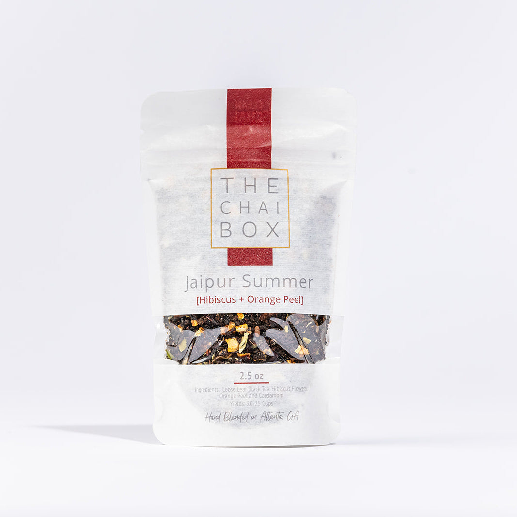 Tea bag from 'The Chai Box' with 'jaipur Summer' flavor on a white background