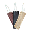 Three jute bags in brown, black, and beige on a white background