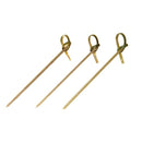 Three wooden skewers with loops on a white background