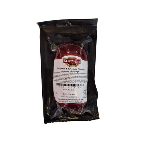 A vacuum-sealed package of Kurzweils Jalapeño & Christian Cheese Summer Sausage, showing the dark red cooked sausage inside a black plastic pouch with a white label.
