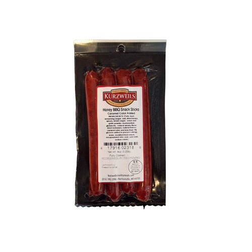 Kurzweils Honey BBQ Snack Sticks in a clear plastic package with a white and red label, showing four reddish-brown snack sticks inside, on a white background.